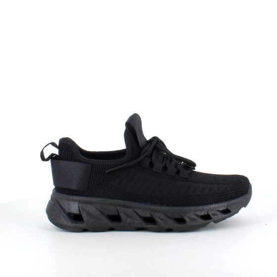 Svart slip-on sko med strikket overdel