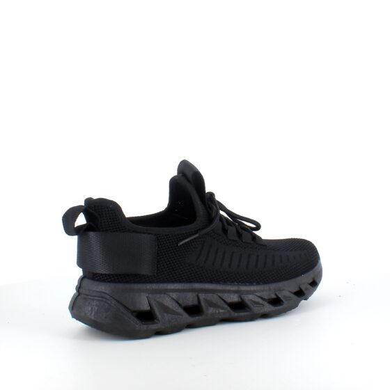 Svart slip-on sko med strikket overdel